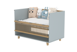 Elegant Light Crib with Folding Sides